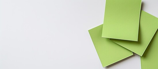 Poster - A green notepad sticker set against a white background allows ample copy space for an image