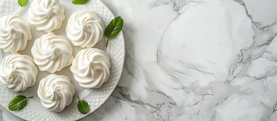 Aufkleber - Top view of a white marble table with a tray of delicious meringue cookies Ideal for adding text with copy space image