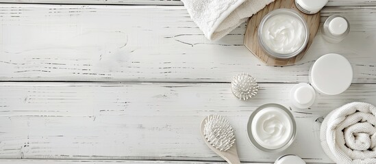 Poster - Skin care products displayed on a white wooden surface with ample copy space image