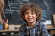 © AI Visual Vault - Smiling Boy in Classroom: A young boy with curly hair beams with joy and curiosity in a classroom setting, showcasing the innocence and wonder of childhood learning.