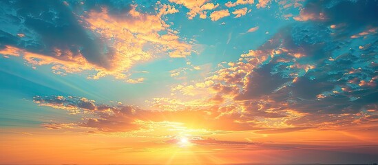 Wall Mural - Apicture depicting a stunning sunset landscape the sky is a vibrant mix of bright blue and radiant yellow orange sunlight creating a nature inspired background with a texture suitable for design like