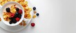 © Gular - Cornflakes berries milk and coffee laid out on a white plate on a plain white backdrop create a copy space image for quick healthy breakfast inspiration in a close up flat lay style