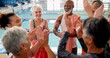 © peopleimages.com - Swimming pool, senior people and applause for learning, exercise and training together indoors. Water sports, hydro and physiotherapy for group aqua rehabilitation, health and wellness with coach