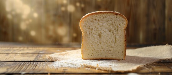 Poster - Fresh white bread slice on a wooden table background with copy space image Vegan product