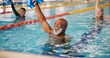 © peopleimages.com - Dumbbell, training and mature man in swimming pool for exercise, healthy body and strong muscle. Weight, water and aerobics class for fitness, physiotherapy and rehabilitation of happy senior people