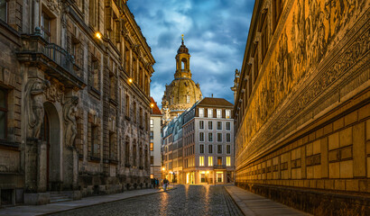 Wall Mural - Dresden, Germany. Evening view from the street Augustusstrabe to the Dresden Frauenkirche and old porcelain artwork Procession of princes (Fuerstenzug), Dresden, Germany.