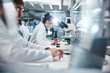 © PeakPoints/peopleimages.com - Medical, research and scientist in laboratory with microscope, observation and experiment for study. Healthcare, employees or doctor with machine for examine cells, microorganisms and investigation