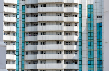 Wall Mural - many windows and walls facade of a modern skyscraper without people