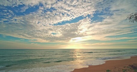 Poster - Beautiful sea sunrise or sunset sky over sea,Amazing sky and shining golden waves landscape,Slow motion waves crashing on sandy shore,Beach Sea sky nature background