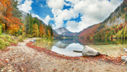 Wall Mural - captivating autumn scene of vorderer langbathsee lake.
