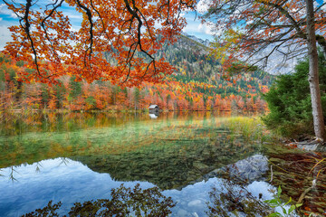 Wall Mural - Captivating autumn scene of Hinterer Langbathsee lake.