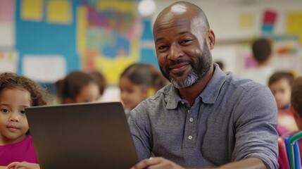 A person sitting at a desk with a laptop open, possibly working or studying