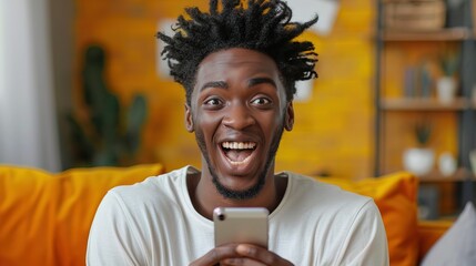 Wall Mural - Beautiful black man excited surprise face expression, holding smartphone, white teeth, beautiful stylish hairstyle