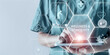 © Parradee - Wellness and longevity concept. A healthcare professional uses a digital tablet to access information on wellness and longevity, using technology for promoting long-term health and well-being.
