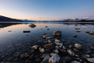 Wall Mural - A tranquil sunset view at Lake Tekapo, New Zealand.