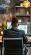© Cloudyew - Business Professional Analyzing Data on Computer in Modern Office