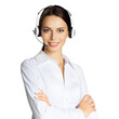© vgstudio - Call center help line service. Studio portrait image of customer support phone sales operator in headset, isolated over white background. Happy smiling young business woman. Female caller worker.