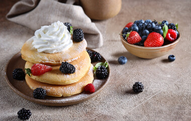 Sticker - american pancakes with fresh berries for breakfast