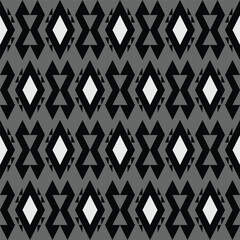 Wall Mural - An elegantly stylish geometric pattern showcasing bold black and white diamonds set against a soft gray background