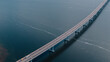© Yakov Knyazev/Stocksy - Aerial View of a Long Bridge Over Water