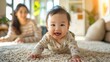 © Saim Art - A smiling little baby with his mother on the background blurred background