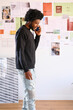 © Guille Faingold/Stocksy - Phone call at office