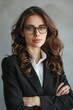 © Cloudyew - Professional businesswoman with clear area for advertising.