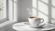 © Jayda_ArtistryHub - A cup of steaming coffee on a white table by a window.