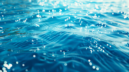 Wall Mural - the clear blue surface of the water gradients from light to dark.