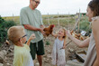 © Anna Artemenko/Stocksy - family on the farm