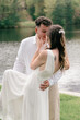 © Lea Jones/Stocksy - portrait of young bride and groom face to face
