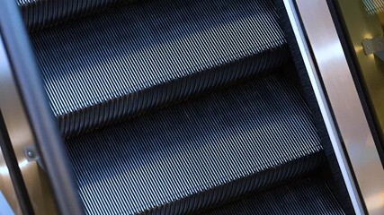 Wall Mural - Escalator stairs on the way down