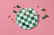 © Marc Tran/Stocksy - Chess Pieces on Round Board with Pink Background