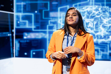 Poster - Happy speaker talks at AI event gathering tech startups managers, investors and academics. Smiling expert hosts sessions geared towards helping IT business leaders tap into artificial intelligence