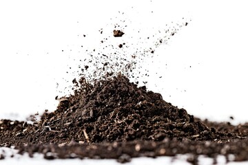 Sticker - A compact pile of dirt sits on a white surface