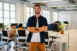 © Nuria Seguí/Stocksy - Male Entrepreneur Portrait In Modern Office