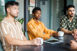 © Nuria Seguí/Stocksy - Businesspeople In A Meeting In Modern Workplace