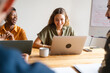 © Nuria Seguí/Stocksy - Businesspeople At Office Of Tech Startup