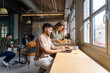 © Nuria Seguí/Stocksy - Entrepreneurs Working Together In Office Of Tech Startup