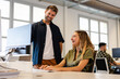 © Nuria Seguí/Stocksy - Entrepreneurs Working Together In A Tech Startup