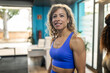 © Lupe Rodríguez/Stocksy - athlete woman in a gym