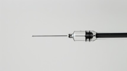 Medical syringe with black fluid on white background symbolizes health and care, highlighting importance of proper dosage and dangers of addiction