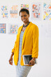 © VICTOR TORRES/Stocksy - Confident Professional Woman Holding Tablet in Artistic Office