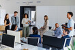© BONNINSTUDIO/Stocksy - Diverse team of professionals collaborating during meeting in office