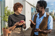 © Luis Velasco/Stocksy - Colleagues Laughing And Chatting