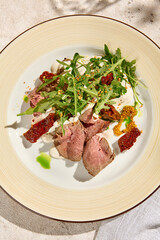 Wall Mural - Gourmet Roast Beef Salad with Arugula, Sun-Dried Tomatoes, and Cheese Mousse in Sunlit Aesthetic