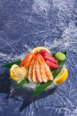 Sticker - Fresh Shrimp, Tuna, and Salmon Sashimi Against Ocean Wave Backdrop Vibrant Seafood Presentation