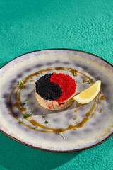 Wall Mural - Yin Yang Crab Salad with Tobiko Caviar and Lemon on Elegant Plate