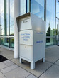 © Raymond Forbes LLC/Stocksy - Ballot Box Democratic Election outside municipal building