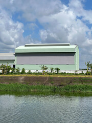 Poster - industrial factory with blue sky and cloud.